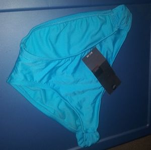Turquoise bikini bottoms. NWT. Size M.